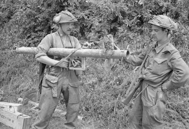 Sergeant F. J. Petrie and sapper L. Roberts examining a captured German Panzerschreck
